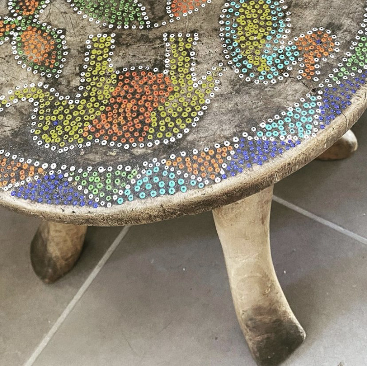 Small table with elephant and duck painting